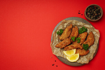 Concept of tasty food with chicken strips, space for text