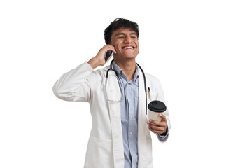 Fototapeta premium Young peruvian male doctor laughing and talking on the phone with a coffee cup. Isolated over white background.