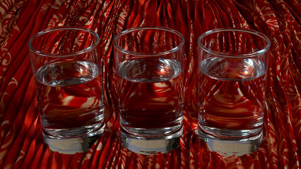 Glasses of water in colorful background