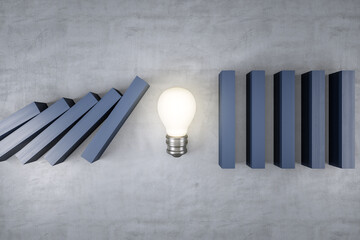 Light bulb in a row of gray domino, stopping the falling dominoes, problem solving and solution, creativity concept. Concrete wall background. 3D Rendering. © Who is Danny