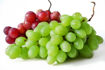 Tasty juice green and red Grapes branch isolated on white background