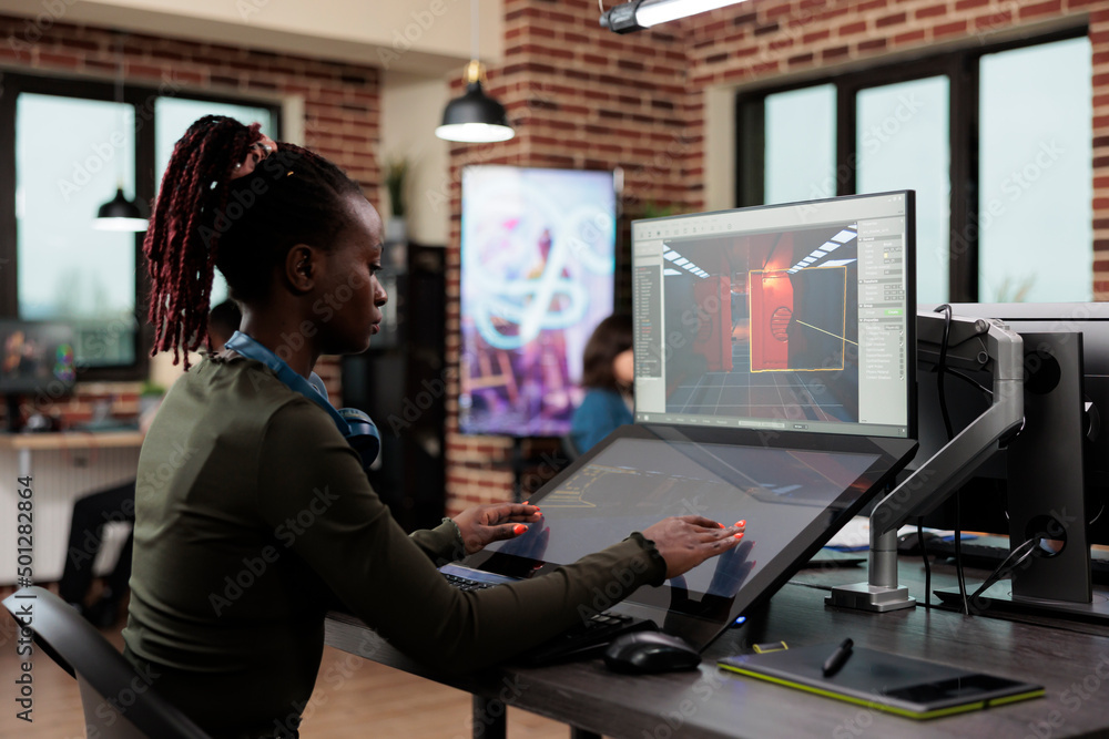 Poster electronic arts company employee working on 3d project while modeling environment. african american 