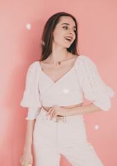 Woman model appearance smiling on pink background