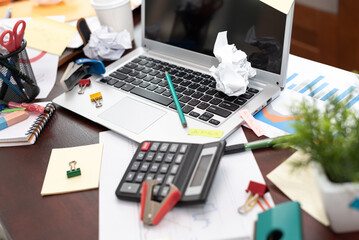 Messy and cluttered desk