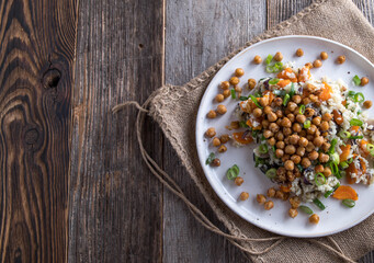 Vegan dinner or lunch with vegetable rice and roasted chick peas