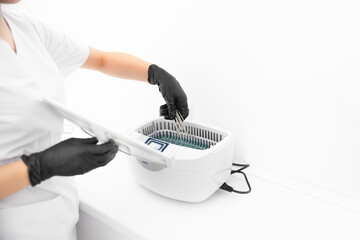 Cleaning systems for medical instruments. Ultrasonic cleaner - obrazy, fototapety, plakaty