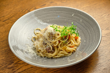 Spaghetti pasta with tomato sauce, mozzarella cheese