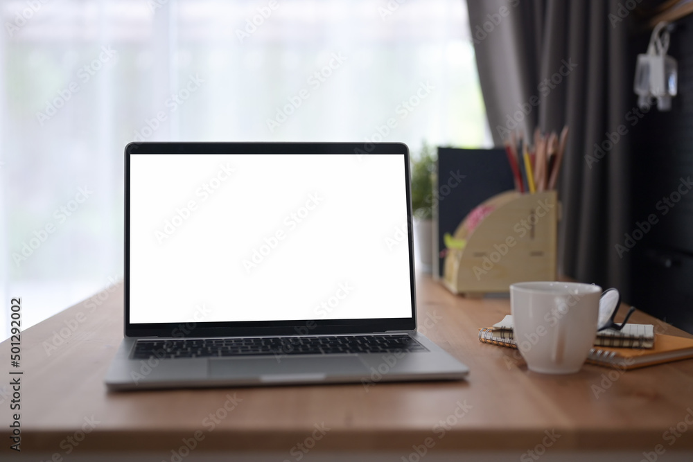 Poster front view computer laptop with white display on wooden table.
