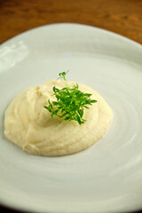Risotto on a white restaurant plate
