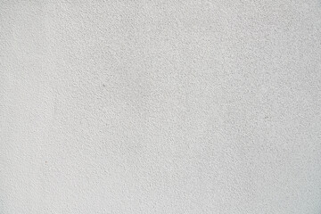 Old white wall of the house closeup.