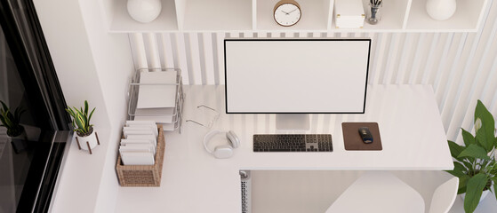 Modern white minimalist workspace interior design top view with PC computer