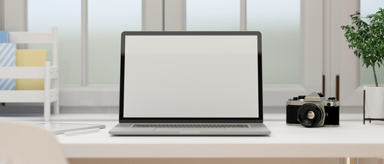 Close-up, Blank screen laptop computer on a modern white office desk