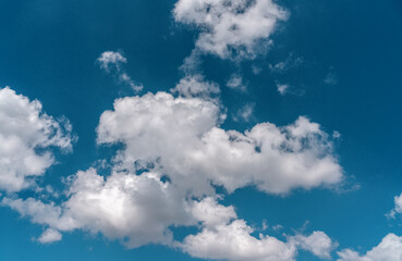 Bright white clouds floating on blue sky