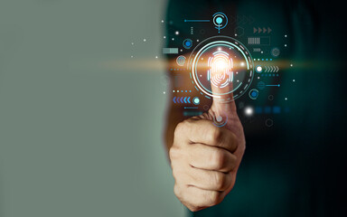 Close-up of man's thumb and fingerprint scanning icon. modern technology with copy space on dark background