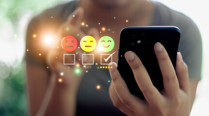 smart woman use smartphone choosing green happy smile face icon. feedback rating and positive customer review experience, satisfaction survey. mental health assessment. world mental health day concept