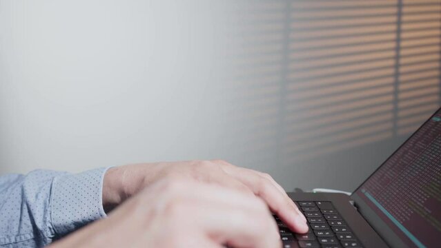 Developing programming and coding technologies. Website design. Coder developing in software develop company office. Programmer typing data code, working on project. Terminal with coding language