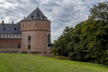 Fototapeta na wymiar Gaasbeek Castle, Belgium. Summer cloudy day travel perspective.