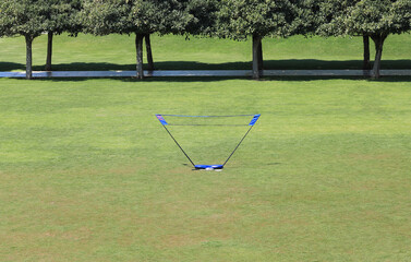 beach badminton net on the lawn