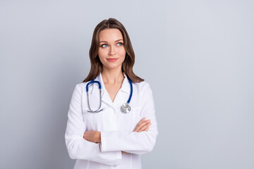 Fototapeta premium Photo of lady cross arms look empty space think decide new covid protection prescription isolated grey color background