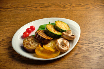 Grilled vegetables with champignons and fresh herbs