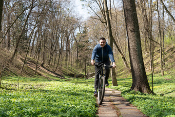 Naklejka premium Man riding on mountain bike