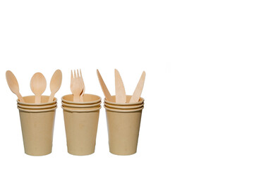 A set of brown eco paper cups for coffee, tea, drink etc., with wooden cutlery  isolated on white background. Environmental friendly concept.