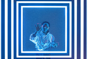 Woman scanning hand to open glass door against blue background