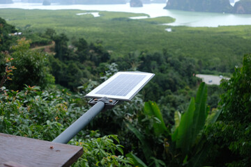 Small solar cell from building above the forest