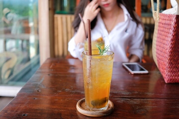 Glass of ice tea with girlfriend at the cafe