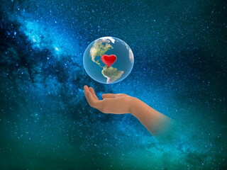earth day  with red heart sumbol  in hands on front blue starry sky nebula hold  world peace  globe concept nature background