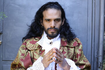 Long haired man wearing baroque fashion - obrazy, fototapety, plakaty