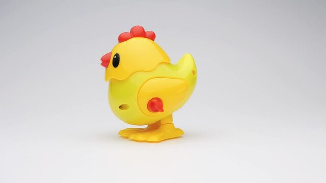 Clockwork chick toy hopping around. 