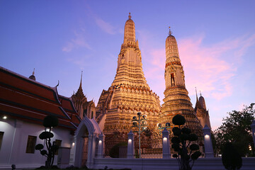 Fantastic View of  Wat Arun Central Prang and Satellite Prang against Twilight Sky, Bangkok, Thailand
