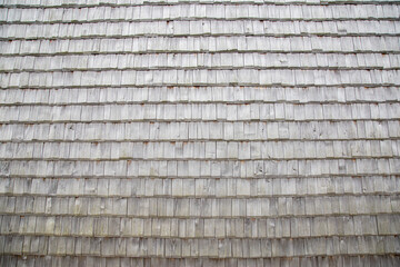 shingle roof. Old method of making roofs from wood, background. Copy space for text
