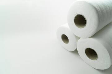 Universal white fabric napkins for cleaning in a roll. Bobbin with napkins for dispenser. Selective focus