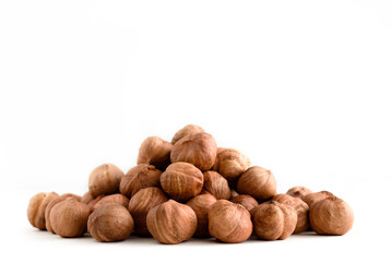 Hazelnuts isolated on white background