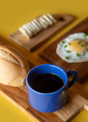 Breakfast - Healthy - Banana, Cheese, Eggs, Bread, Coffee - Yellow Background - serie 