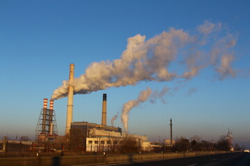 Pollution.industry metallurgical plant dawn smoke smog emissions bad ecology.