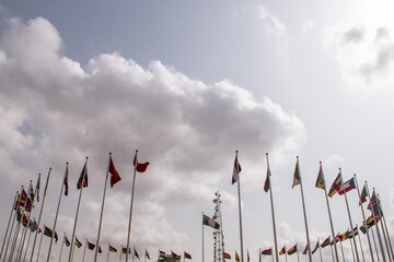 Flag of several nations seen at a park in Lagos, NIGERIA, March 8 2022. Women from different NGOs...