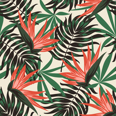 Abstract seamless tropical pattern with bright plants and leaves on a beige background. Beautiful print with hand drawn exotic plants. Printing and textiles.  Vintage pattern. Tropical botanical.