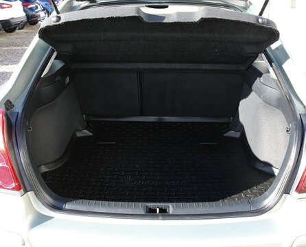 Opened clean modern car trunk.