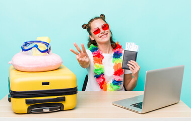 young pretty woman  smiling and looking friendly, showing number three. travel concept