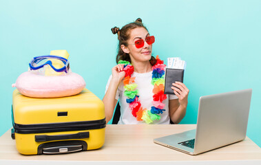 young pretty woman  looking arrogant, successful, positive and proud. travel concept