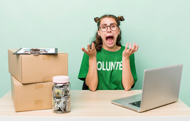 young pretty woman  looking desperate, frustrated and stressed. donation volunteer concept