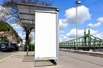 Bus shelter at a busstop. billboard and ad display. base image for mockup. urban street in...