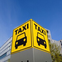 Taxi sign on the street