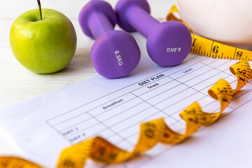 Diet Health Plan. Workout planing. Sport exercise equipment workout and gym background with...
