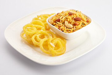 Jelebi famous Indian sweet (tradtional Indian fried sweet dessert) & Chivda or bujiya or namkin