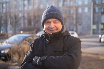 Senior caucasian man smiling happy standing at the city.