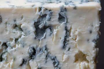 Blue cheese background and texture in the cut, close up, macro